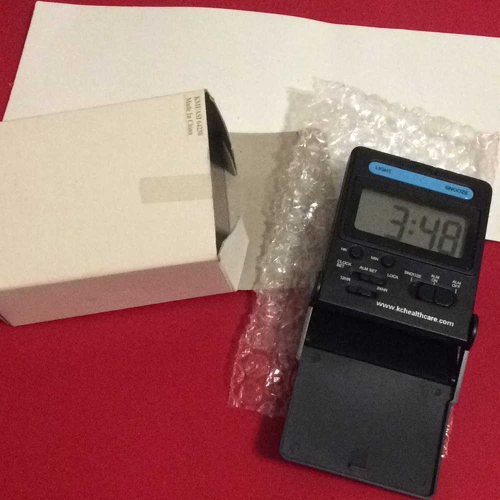 New Kimberly Clark advertising travel alarm clock